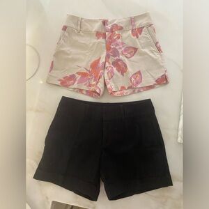 Inc shorts.  Mid waist.  Pockets . 4 inch inseam. Cotton/Spandex